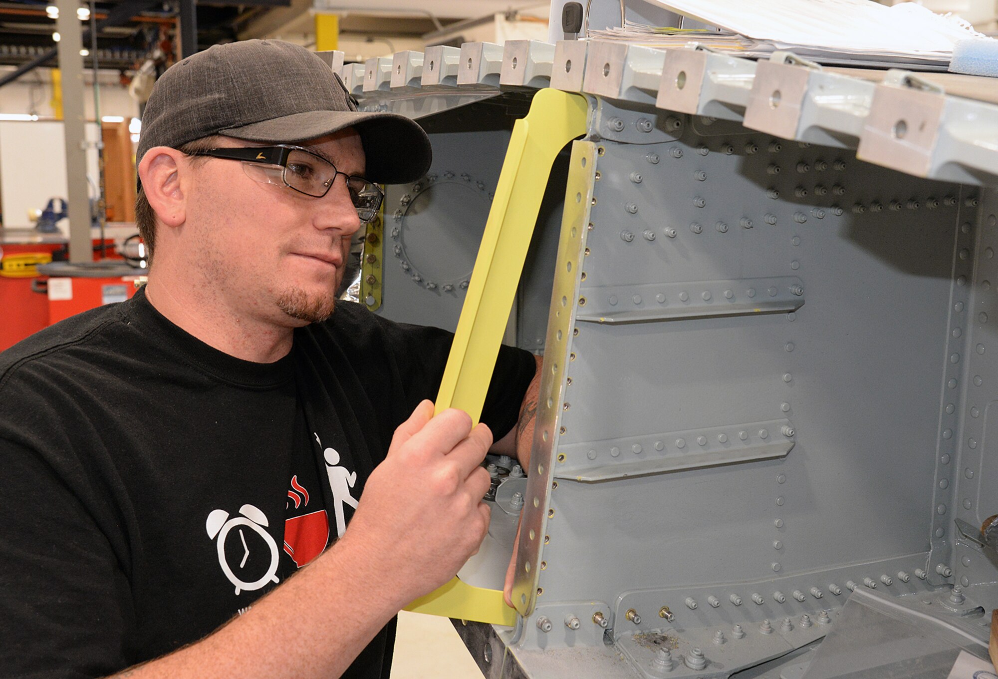 Donoviel Kolter fits a newly manufactured part into an A-10 wing May 5, 2020, at Hill Air Force Base, Utah. The skilled engineers and technicians of the 533rd CMMXS in the Ogden Air Logistics Complex, design, prototype and manufacture thousands of critical components annually, that can’t be found anywhere else in the world. The parts are manufactured in order to bridge a gap in the regular supply system, when there’s no contract in place from an outside source.