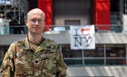 U.S. Army Lt. Col. (Dr.) G. Travis Clifton, Brooke Army Medical Center’s chief of general surgery, poses in front of the Javits Convention Center in New York City, April 22, 2020. Clifton deployed to New York to help ease the burden on local hospitals by aiding COVID-19 and other patients at the Javits.