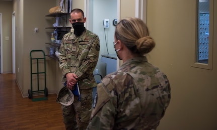 Col. Marc Greene, 628th Air Base Wing and joint base commander, listens to a brief at the veterinary clinic on Joint Base Charleston, S.C., May 21, 2020. Greene assumed command earlier this month, and he  toured the 628th ABW and multiple facilities to learn more about the Joint Base Charleston mission.