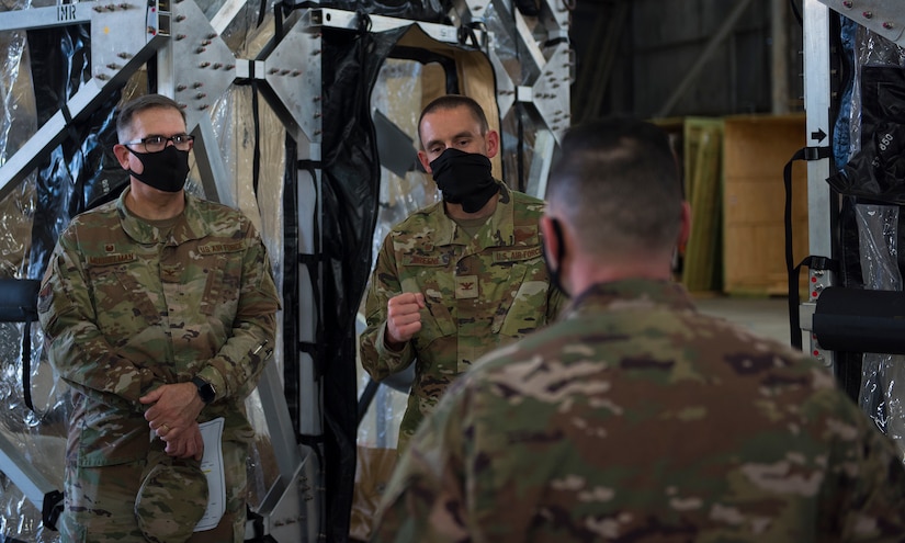 Col. Marc Greene, 628th Air Base Wing and joint base commander, gets briefed on the Transport Isolation System on Joint Base Charleston, S.C., May 21, 2020. Greene assumed command earlier this month, and he  toured the 628th ABW and multiple facilities to learn more about the Joint Base Charleston mission.