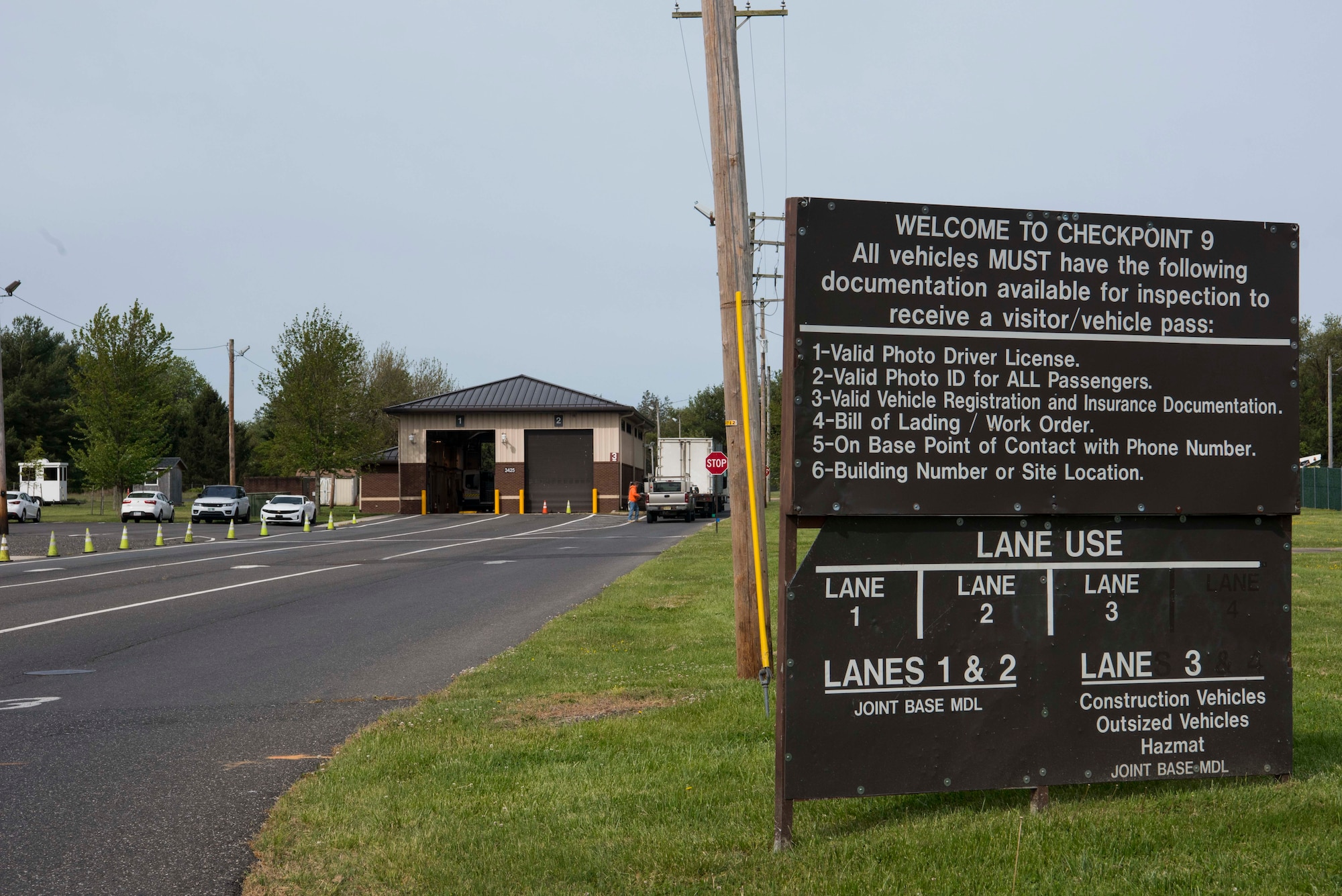 A photo of the Checkpoint 9 sign at JB MDL.