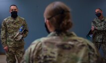 Col. Marc Greene, 628th Air Base Wing and joint base commander, listens to a brief at the family medicine clinic on Joint Base Charleston, S.C., May 21, 2020. Greene assumed command earlier this month, and he  toured the 628th ABW and multiple facilities to learn more about the Joint Base Charleston mission.