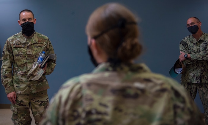 Col. Marc Greene, 628th Air Base Wing and joint base commander, listens to a brief at the family medicine clinic on Joint Base Charleston, S.C., May 21, 2020. Greene assumed command earlier this month, and he  toured the 628th ABW and multiple facilities to learn more about the Joint Base Charleston mission.