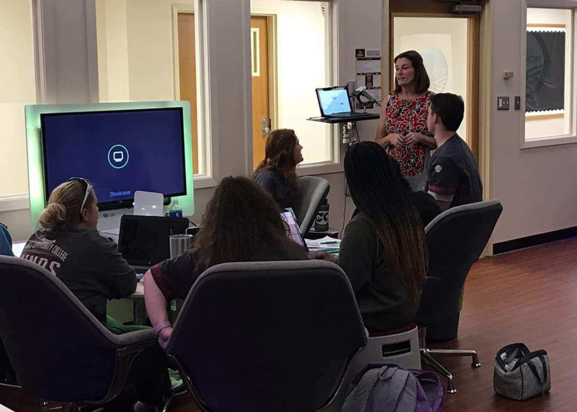 Natalie McKee, a Hinds Community College nursing instructor, stops during a break to talk to a group of students about one of the subjects from class. McKee, a lieutenant colonel, also serves as a clinical nurse in the 403rd Aeromedical Staging Squadron in the 403rd Wing at Keesler Air Force Base, Miss. (courtesy photo)