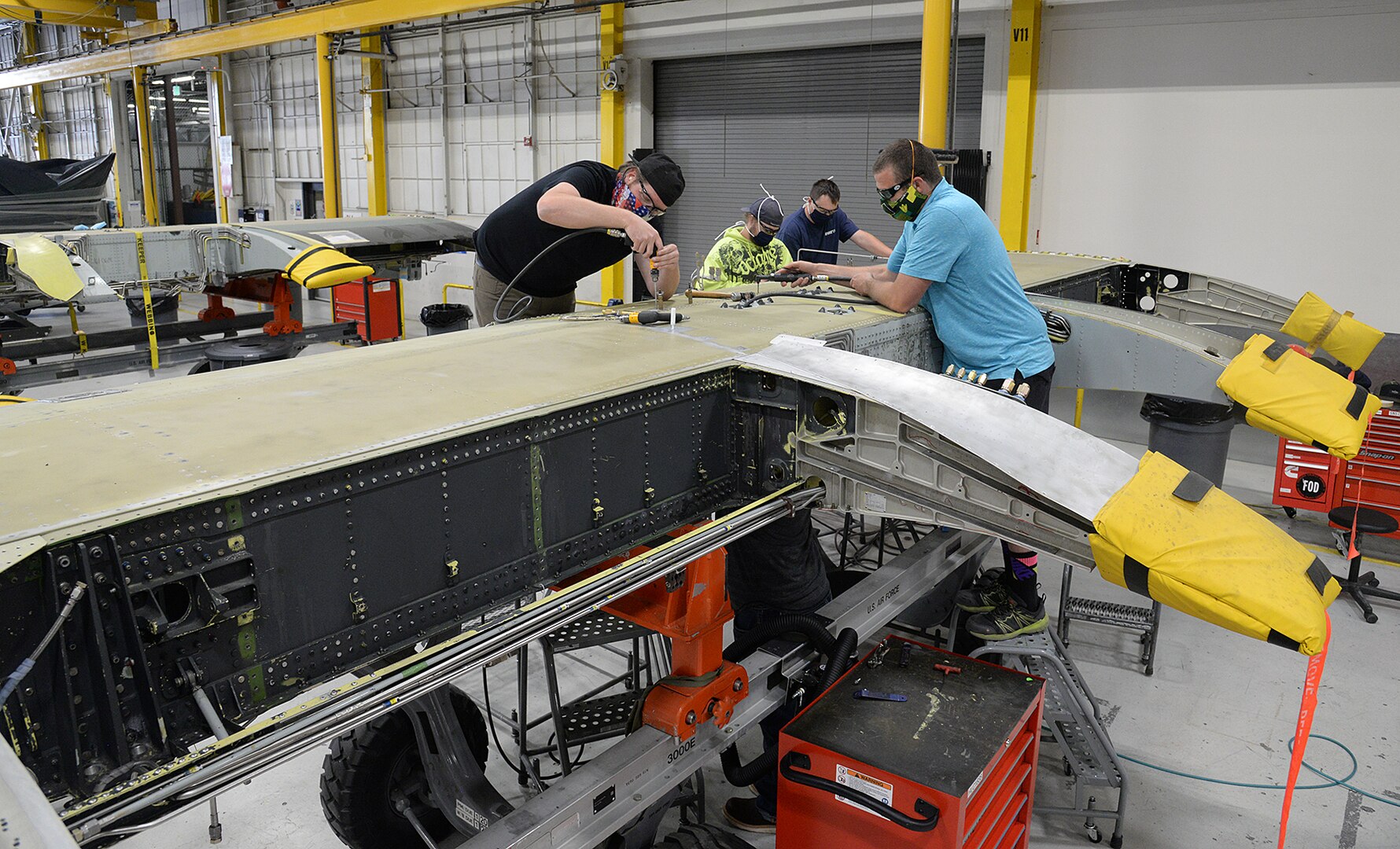 Sheet metal mechanics work an A-10 wing with newly manufactured parts May 5, 2020, at Hill Air Force Base, Utah. The skilled engineers and technicians of the 533rd CMMXS in the Ogden Air Logistics Complex, design, prototype and manufacture thousands of critical components annually, that can’t be found anywhere else in the world.