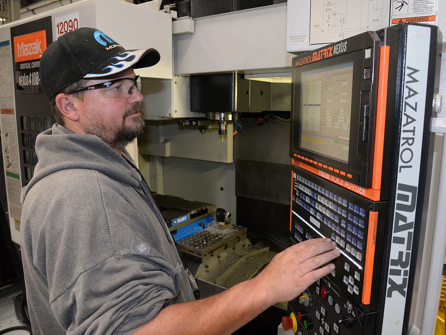 Troy Jolley, 533rd Commodities Maintenance Squadron, programs a Mazak machine May 5, 2020, at Hill Air Force Base, Utah. The skilled engineers and technicians of the 533rd CMMXS in the Ogden Air Logistics Complex, design, prototype and manufacture thousands of critical components annually, that can’t be found anywhere else in the world. The parts are manufactured in order to bridge a gap in the regular supply system, when there’s no contract in place from an outside source.