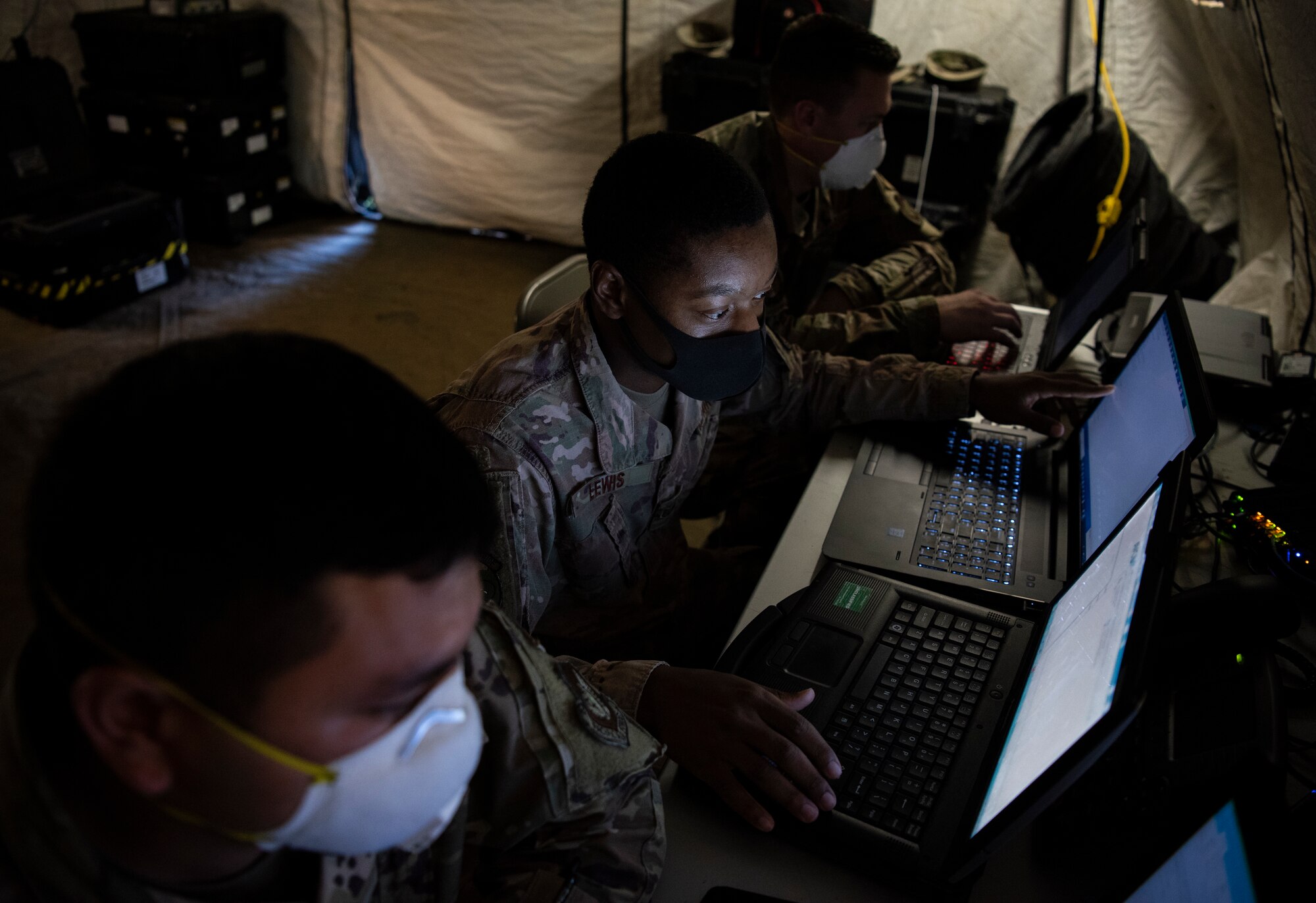 Airmen assigned to the 644th Combat Communications Squadron work to keep communications operational at the Expeditionary Medical Support System (EMEDS),  located at Naval Hospital, Guam, May 13, 2020.