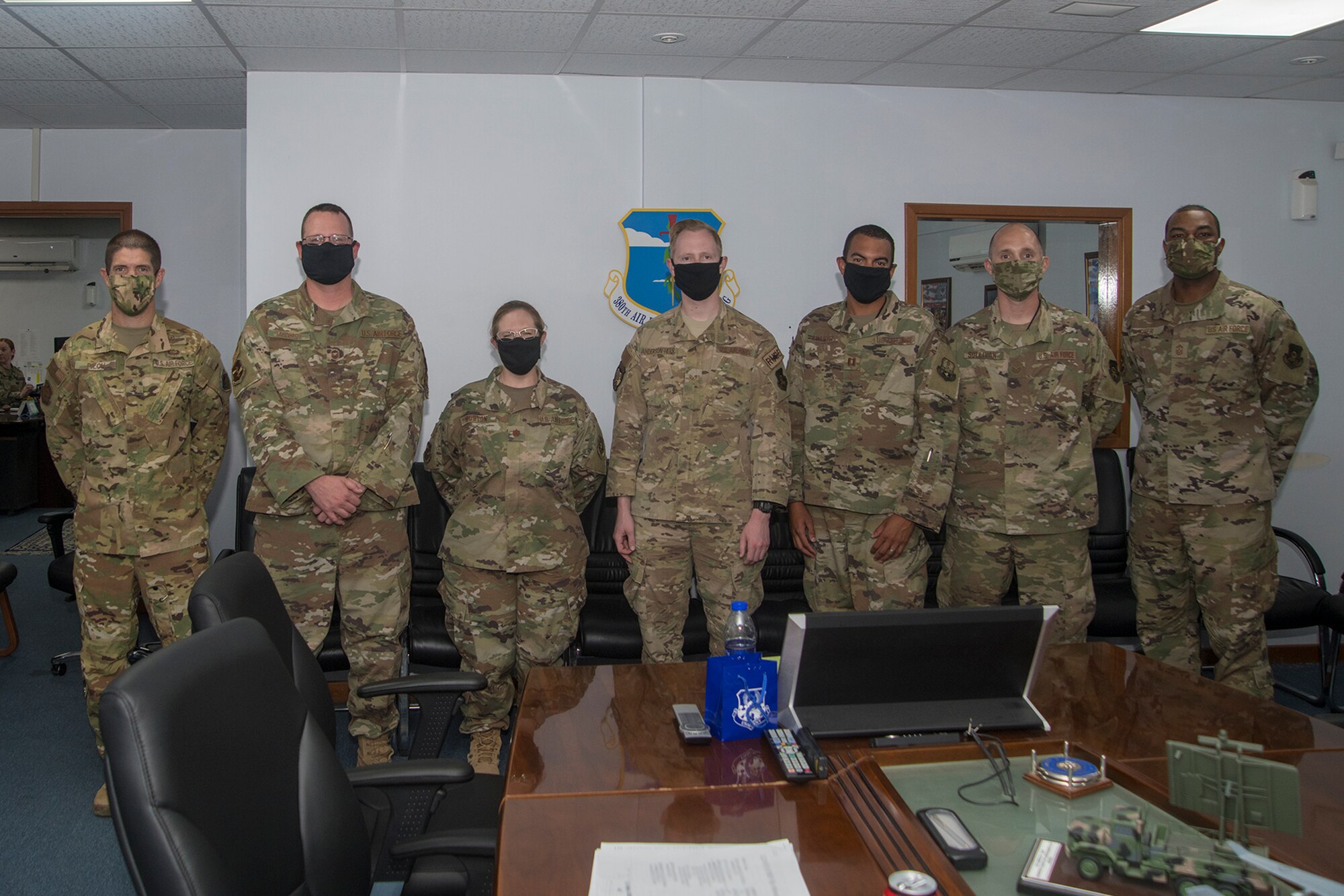 U.S. Air Force Airmen deployed to the 380th Air Expeditionary Wing pose for a portrait at Al Dhafra Air Base, United Arab Emirates, May 13, 2020.