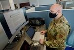 Washington Air National Guard Maj. Brian Banke, a chaplain with the Western Air Defense Sector, functions as the training manager for the COVID-19 mapping mission for the Washington National Guard at the Washington State Department of Health (DOH) offices in Tumwater, Washington, May 15, 2020. The Washington National Guard is supporting the DOH to prevent the spread of the coronavirus as Washington prepares to move to reopening parts of the state.