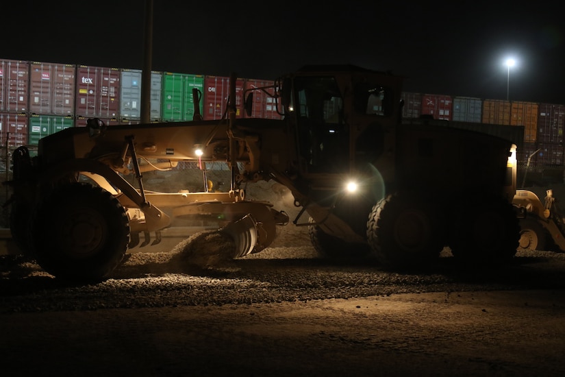 U.S Army Soldiers from the 30th Armored Brigade Combat Team work to repair a roadway on May 20, 2020 in Kuwait. The Soldiers from the 30th ABCT work during the night to avoid the extreme heat of the day, and be able to work longer on the project. (U.S. Army photo by Sgt. Andrew Winchell)