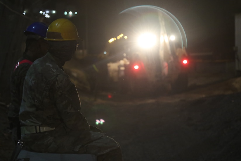 U.S Army Soldiers from the 30th Armored Brigade Combat Team work to repair a roadway on May 20, 2020 in Kuwait. The Soldiers from the 30th ABCT work during the night to avoid the extreme heat of the day, and be able to work longer on the project. (U.S. Army photo by Sgt. Andrew Winchell)