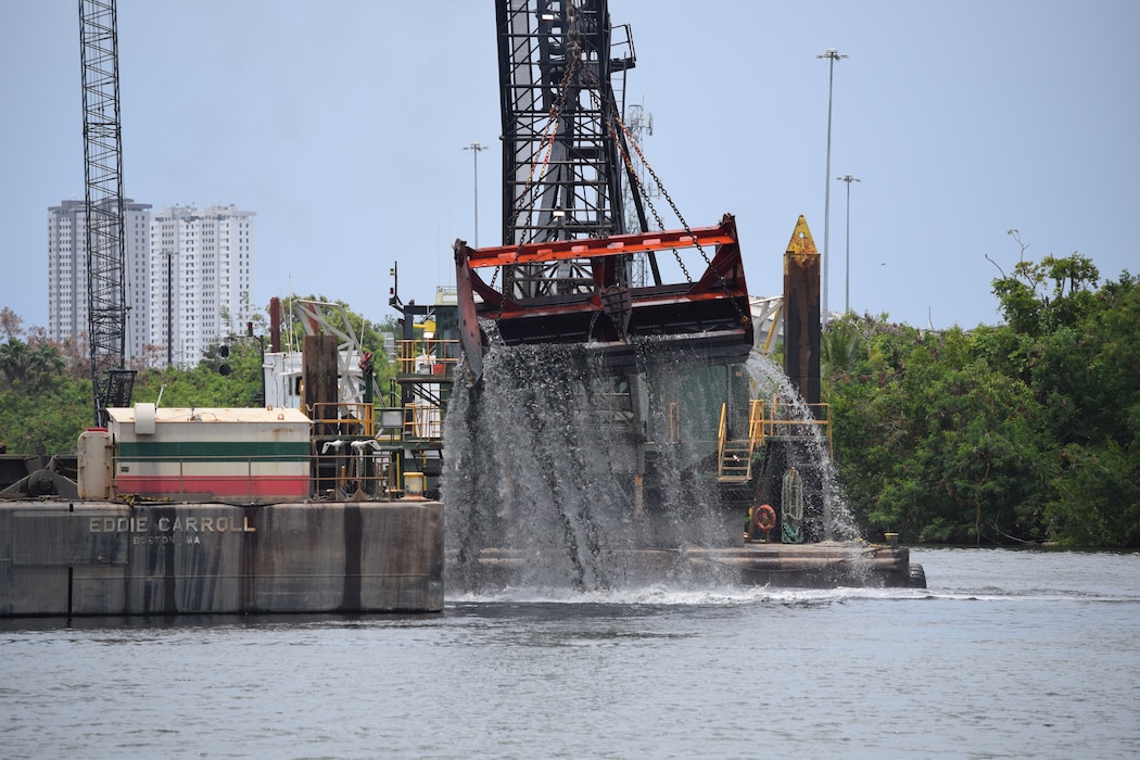 Hydraulic claw is seen coming off the water