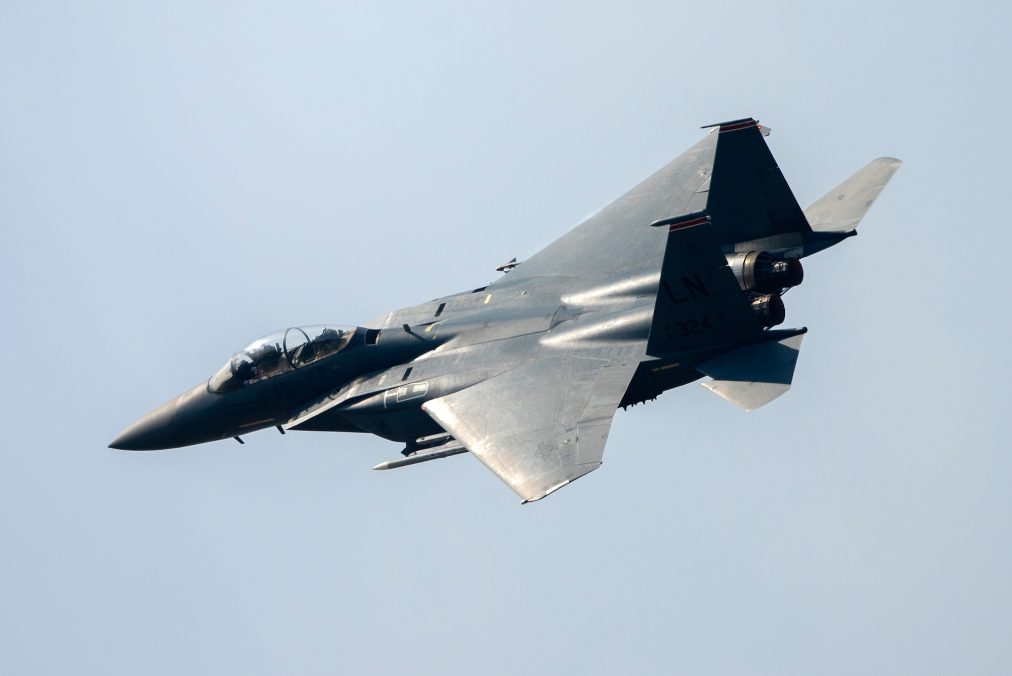 An F-15E Strike Eagle assigned to the 494th Fighter Squadron flies over Royal Air Force Lakenheath, England, May 20, 2020. The Liberty Wing continues to maintain combat readiness in order to safeguard U.S. national interests and those of our allies and partners. (U.S. Air Force photo by Airman 1st Class Jessi Monte)