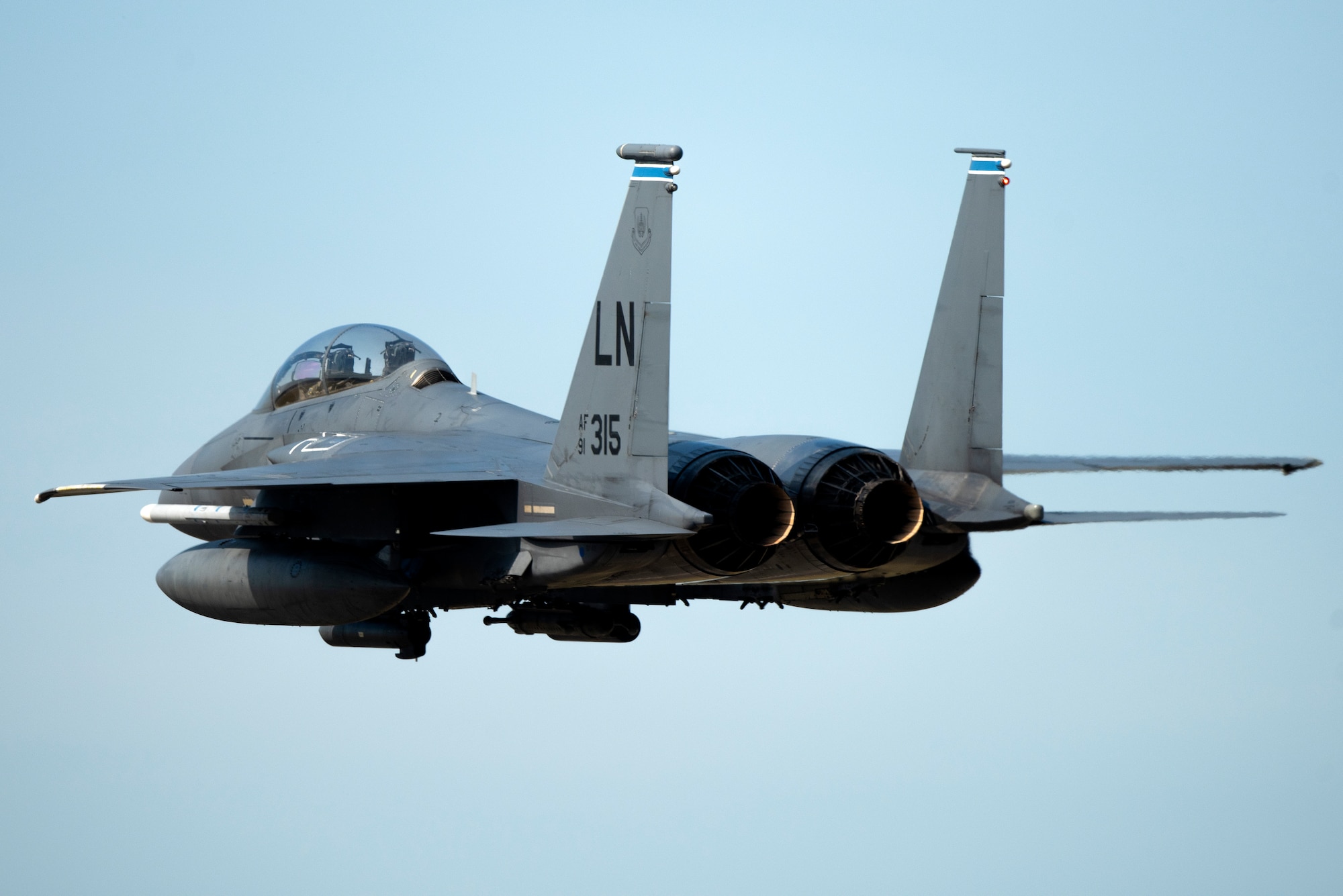 An F-15E Strike Eagle assigned to the 492nd Fighter Squadron flies over Royal Air Force Lakenheath, England, May 20, 2020. An array of avionics and electronics systems gives the F-15E the capability to fight at low altitude, day or night and in all weather. (U.S. Air Force photo by Airman 1st Class Jessi Monte)