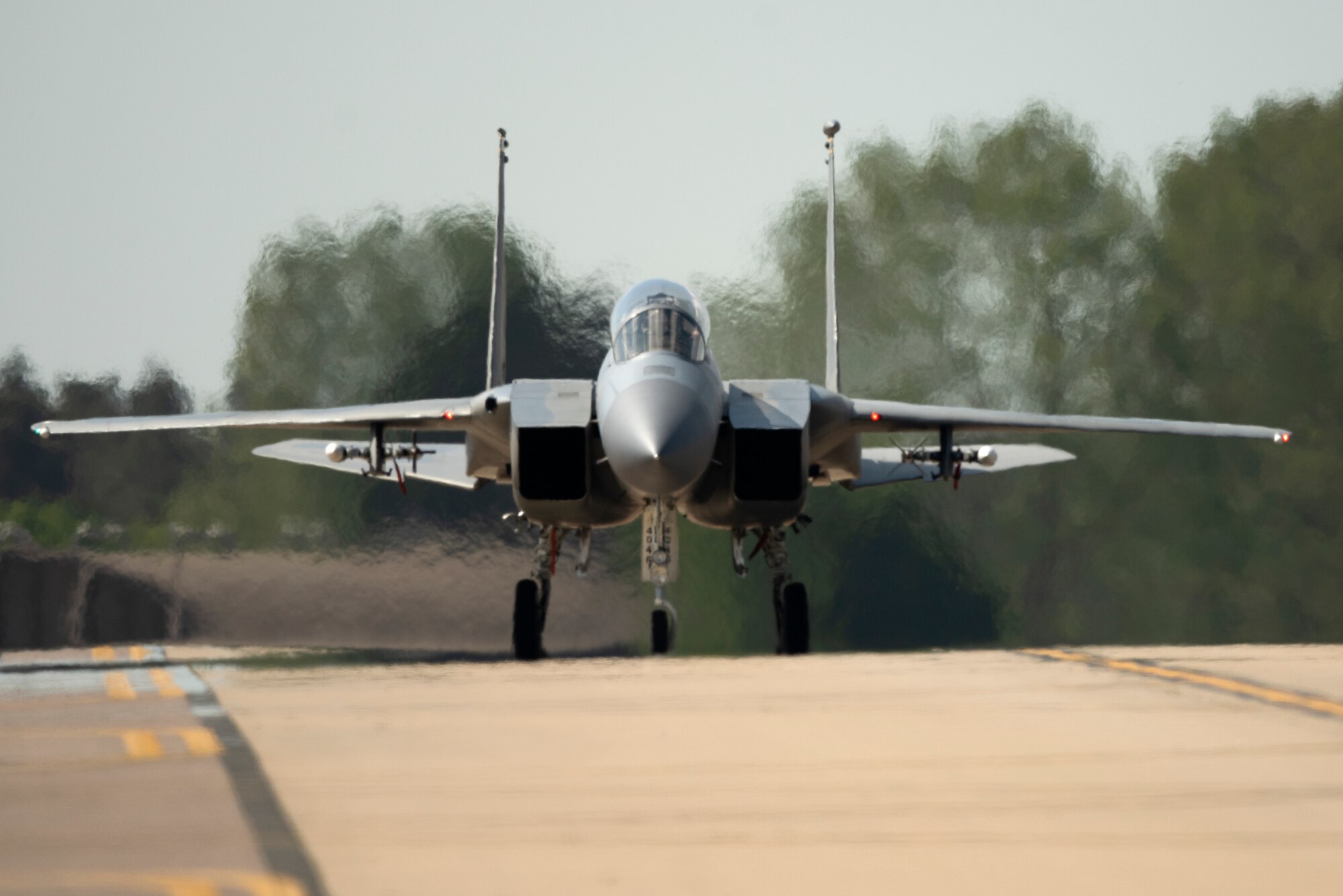 An F-15C Eagle assigned to the 493rd Fighter Squadron taxis to the runway at Royal Air Force Lakenheath, England, May 20, 2020. Despite the current COVID-19 crisis, the 48th Fighter Wing continues to maintain combat readiness in order to safeguard U.S. national interests and those of our allies and partners. (U.S. Air Force photo by Airman 1st Class Jessi Monte)