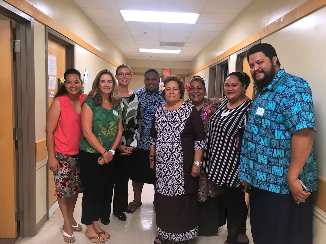 Jessica Podoski (second from left) and the American Samoa climate change working group pause for a photo with U.S. Congresswoman Aumua Amata (center) during the October 2019 workshop for the American Samoa Climate Related Vulnerability Assessment for Transportation Infrastructure Study.