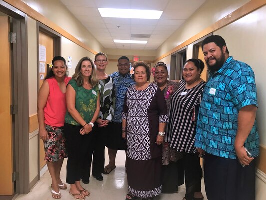 Jessica Podoski (second from left) and the American Samoa climate change working group pause for a photo with U.S. Congresswoman Aumua Amata (center) during the October 2019 workshop for the American Samoa Climate Related Vulnerability Assessment for Transportation Infrastructure Study.