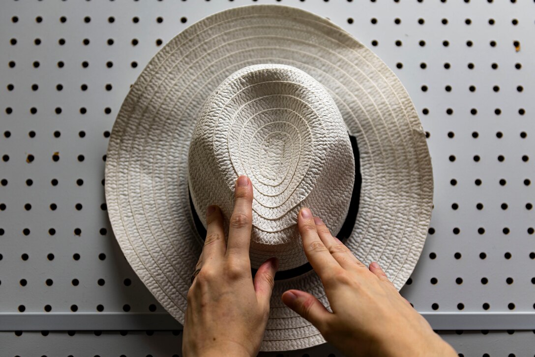 Photo of a patron shopping at the Thrift Shop.