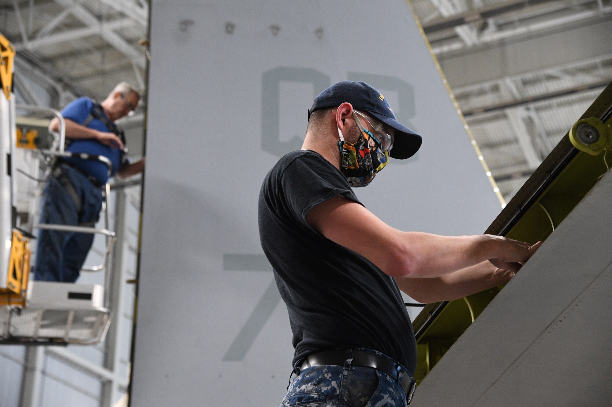 Jared Chidester, 309th Aircraft Maintenance Group aircraft mechanic, works on a C-130 at Hill Air Force Base, Utah, May 8, 2020. Comprised of seven maintenance squadrons and more than 2,000 personnel, the 309th AMXG performs depot maintenance, repair and overhaul on A-10, C-130, F-16, F-22, F-35 and T-38 airframes. (U.S. Air Force photo by R. Nial Bradshaw)