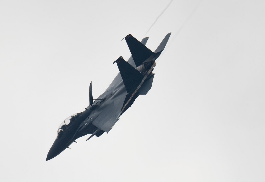 An F-15E Strike Eagle assigned to the 494th Fighter Squadron flies over Royal Air Force Lakenheath, England, May 27, 2020. U.S. Air Force F-15s assigned to the 48th Fighter Wing, F-16s assigned to the 31st Fighter Wing and 52nd Fighter Wing, and KC-135s assigned to the 100th Air Refueling Wing participated in a large force exercise within the U.K. North Sea airspace. (U.S. Air Force photo by Airman 1st Class Jessi Monte)