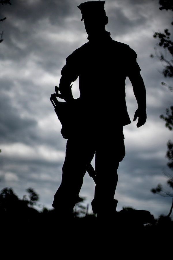 Cpl. Blake Thompson, a combat engineer with Special Purpose Marine Air-Ground Task Force - Southern Command, uses a metal detector to locate and identify simulated improvised explosive devices during a certification exercise at Marine Corps Base Camp Lejeune, North Carolina, April 23, 2020. The CERTEX is the culmination exercise that will test the training and readiness of the Marines and Sailors of the SPMAGTF-SC for certification to deploy. Once certified, the SPMAGTF-SC will be ready to conduct crisis response, theater security cooperation training and general engineering projects alongside partner nation militaries in Latin America and the Caribbean. Thompson is a native of Portland, Oregon. (U.S. Marine Corps photo by Sgt. Andy O. Martinez)