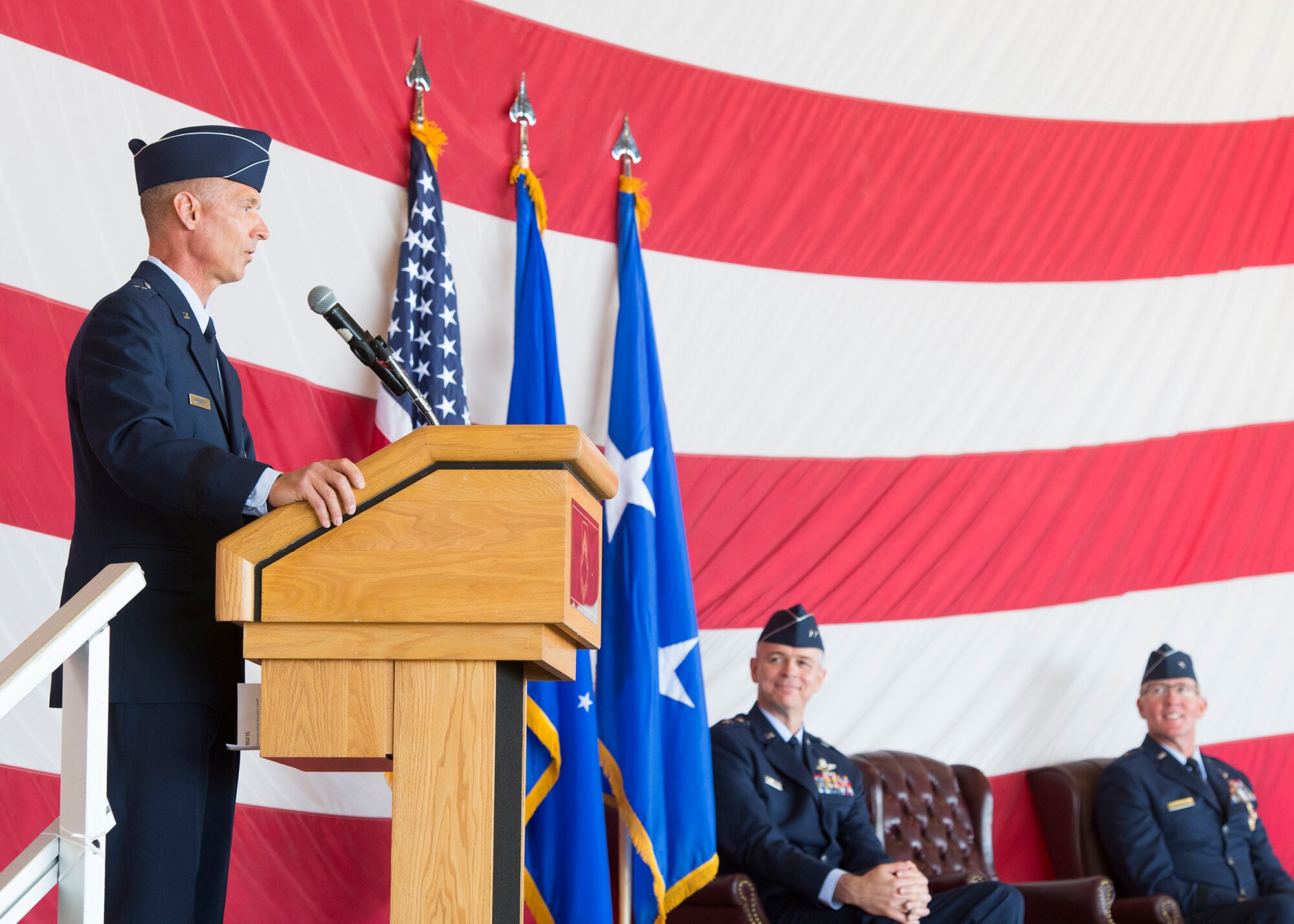 Brig. Gen. Gregory Kreuder, 56th Fighter Wing commander, provides remarks after assuming command from Brig. Gen. Todd Canterbury, 56th Fighter Wing outgoing commander (far right), during the 56th FW Change of Command ceremony, May 27, 2020, at Luke Air Force Base, Ariz.
