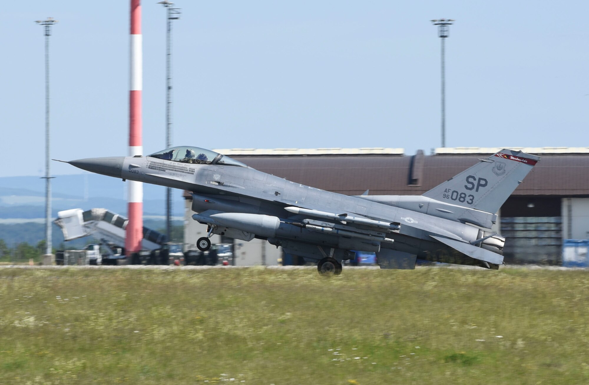 An U.S. Air Force F-16 Fighting Falcon, assigned to the 480th Fighter Squadron, lands at Spangdahlem Air Base, Germany, to participate in a large force exercise within the North Sea airspace, U.K., May 27, 2020. These exercises provide both aircrew and support personnel the experience needed to maintain a ready force, and by integrating multiple aircraft, aircrews are able to train for different objectives, which is critical to ensuring the collective defense of the NATO alliance. (U.S. Air Force photo by Senior Airman Melody W. Howley)