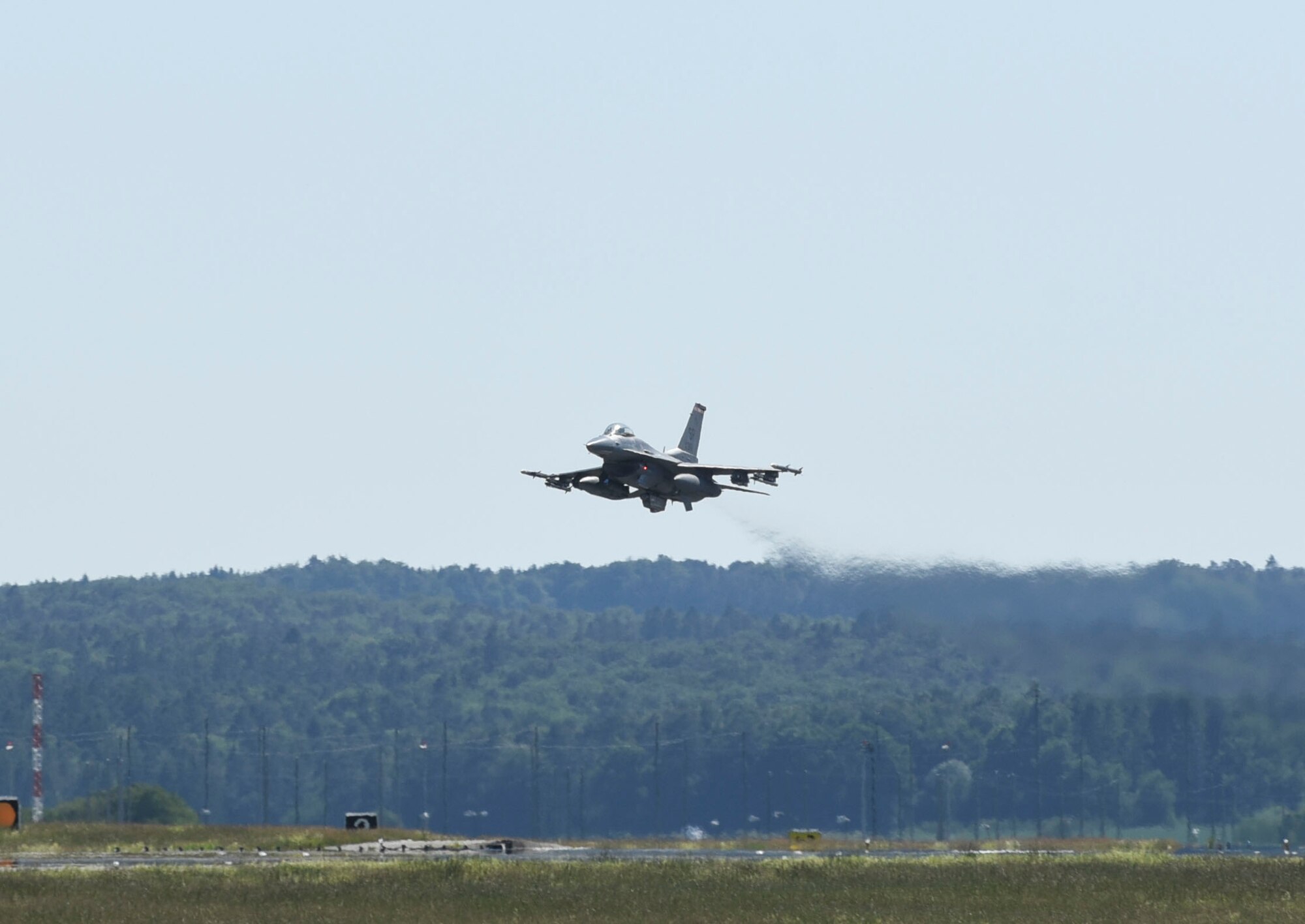 A U.S. Air Force F-16 Fighting Falcon, assigned to the 480th Fighter Squadron, begins to land at Spangdahlem Air Base, Germany, after participating in a large force exercise within the North Sea airspace, U.K., May 27, 2020. LFE’s sharpen combat readiness, increase tactical proficiency, and demonstrate the U.S. commitment to regional security. (U.S. Air Force photo by Senior Airman Melody W. Howley)