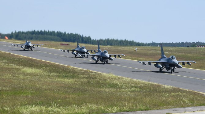 U.S. Air Force F-16 Fighting Falcons, assigned to the 480th Fighter Squadron, taxi off at Spangdahlem Air Base, Germany, to participate in a large force exercise within the North Sea airspace, U.K., May 27, 2020. Multiple wings from across U.S. Air Forces in Europe participated in the LFE, demonstrating the U.S. Air Force’s ability to integrate different aircraft. (U.S. Air Force photo by Senior Airman Melody W. Howley)