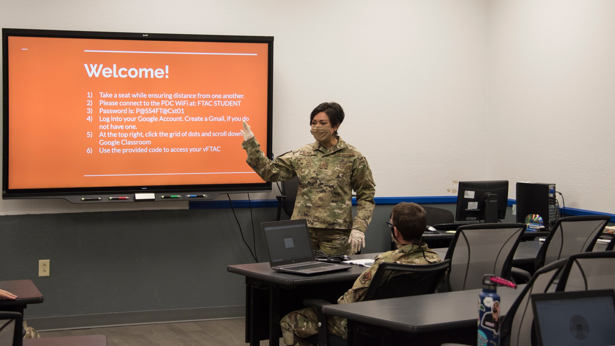 A photo of an FTAC instructor teaching a class