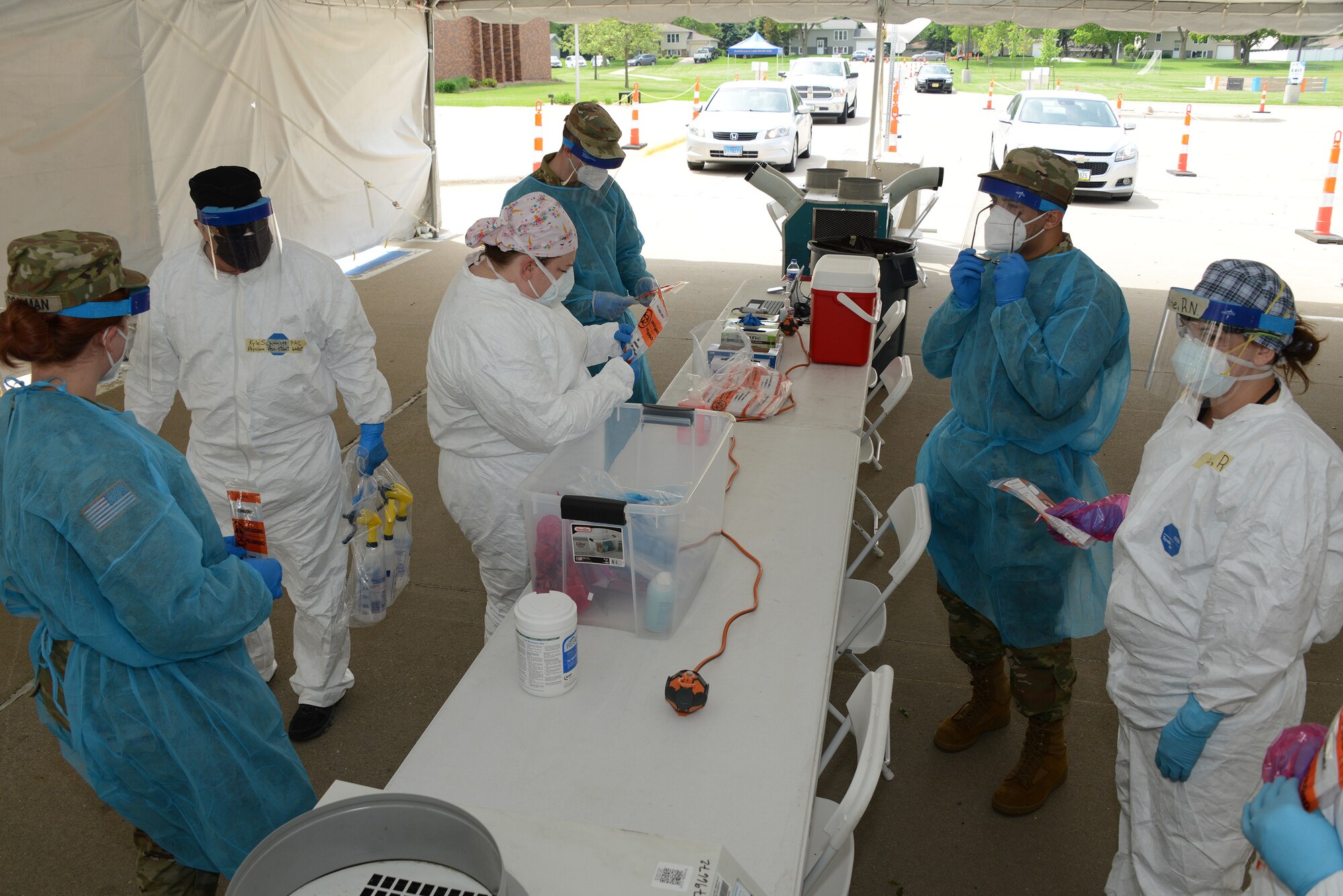 Members of the Iowa Air National Guard provide assistance at the “TestIowa” COVID-19 test site in Sioux Center, Iowa on May 27, 2020.