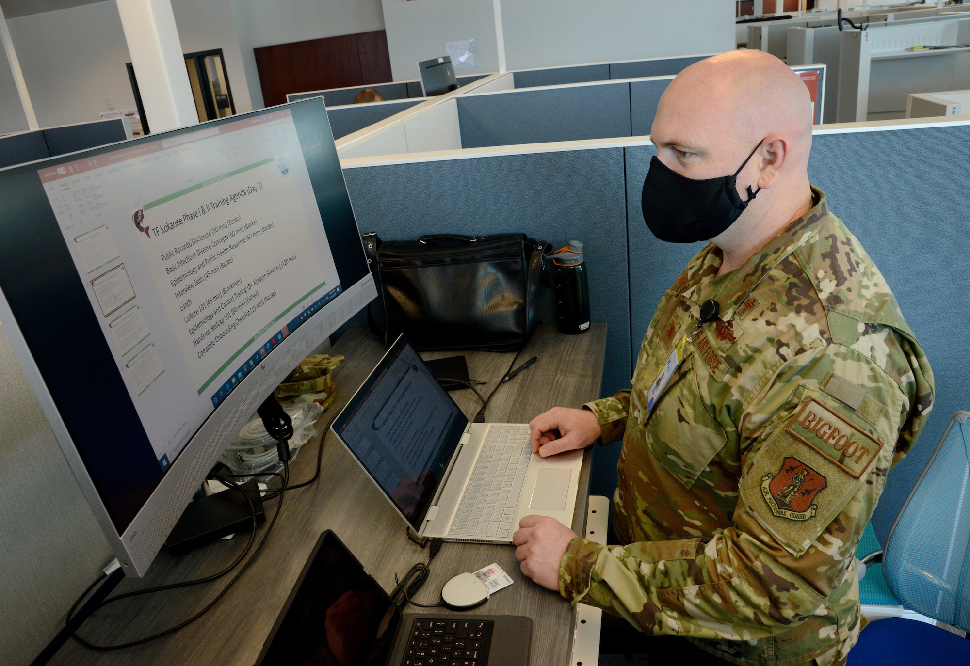 Washington Air National Guard Maj. Brian Banke, a chaplain with the Western Air Defense Sector, functions as the training manager for the COVID-19 mapping mission for the Washington National Guard at the Washington State Department of Health (DOH) offices in Tumwater, Washington, May 15, 2020. The Washington National Guard is supporting the DOH to prevent the spread of the coronavirus as Washington prepares to move to reopening parts of the state.