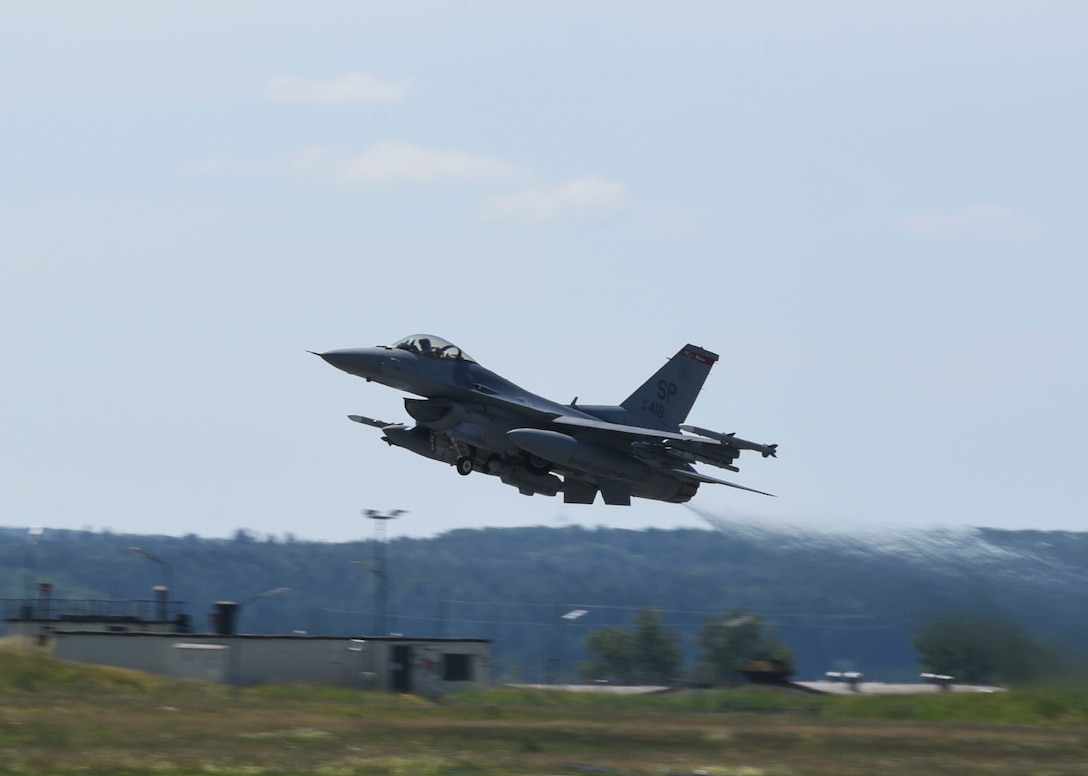 A U.S. Air Force F-16 Fighting Falcon, assigned to the 480th Fighter Squadron, takes off at Spangdahlem Air Base, Germany, to participate in a large force exercise within the North Sea airspace, U.K., May 27, 2020. The North Sea airspace provides the capability for aircrew to train against a high end near-peer threat. Additionally, aircrews are able to pair multiple fourth generation platforms together to increase interoperability and maximize capabilities of participating aircraft. (U.S. Air Force photo by Senior Airman Melody W. Howley)