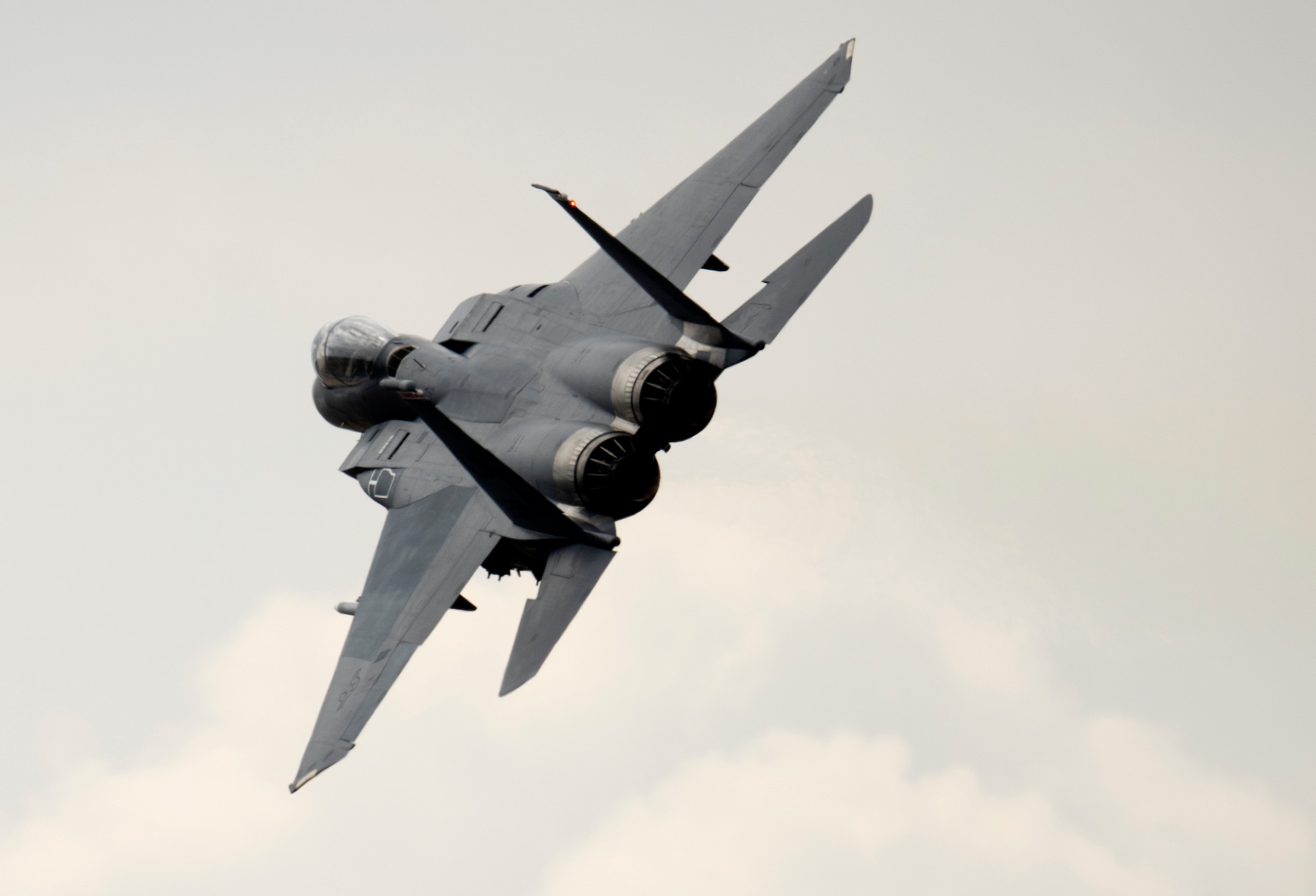 An F-15E Strike Eagle assigned to the 494th Fighter Squadron flies over Royal Air Force Lakenheath, England, May 27, 2020. U.S. Air Force F-15s assigned to the 48th Fighter Wing, F-16s assigned to the 31st Fighter Wing and 52nd Fighter Wing, and KC-135s assigned to the 100th Air Refueling Wing participated in a large force exercise within the U.K. North Sea airspace. (U.S. Air Force photo by Airman 1st Class Jessi Monte)