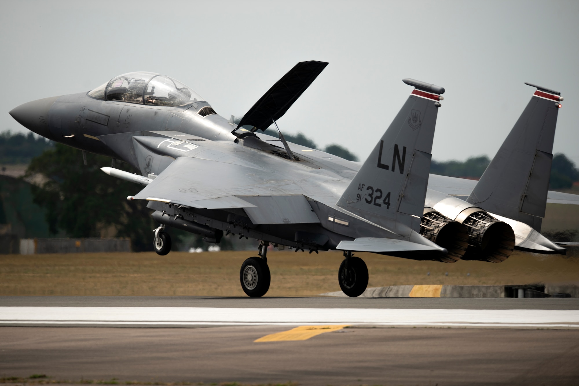 An F-15E Strike Eagle assigned to the 494th Fighter Squadron lands at Royal Air Force Lakenheath, England, May 27, 2020. U.S. Air Force F-15s assigned to the 48th Fighter Wing, F-16s assigned to the 31st Fighter Wing and 52nd Fighter Wing, and KC-135s assigned to the 100th Air Refueling Wing participated in a large force exercise within the U.K. North Sea airspace. (U.S. Air Force photo by Airman 1st Class Jessi Monte)