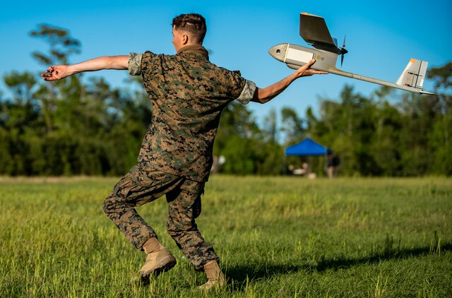 A U.S. Marine launches an RQ-11B Raven during an RQ-11B Raven Operator Course at Marine Corps Base Camp Lejeune, N.C., April 27.