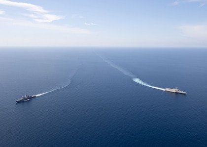 SOUTH CHINA SEA (May 25, 2020) The Independence-variant littoral combat ship USS Gabrielle Giffords (LCS 10), right, exercises with the Republic of Singapore Navy Formidable-class multi-role stealth frigate RSS Steadfast (FFS 70) in the South China Sea, May 25, 2020. Gabrielle Giffords, part of Destroyer Squadron Seven, is on a rotational deployment, operating in the U.S. 7th Fleet area of operations to enhance interoperability with partners and serve as a ready-response force.