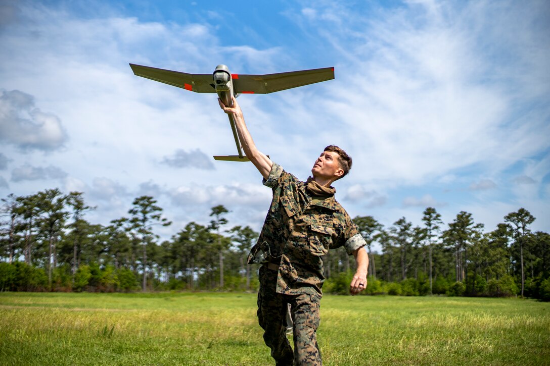 U.S. Marines train with an RQ-11B Raven during an operator course at Camp Lejeune, N.C., April 27.