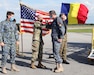 Col. Michael J. Rowland, Alabama state surgeon, commander Medical Detachment, Army National Guard, welcomes Col. Teodor Aurelian, SPÂNU, branch chief, National Military Command Bucuresti, May 25, 2020, at Montgomery Aviation, Montgomery, Alabama. Romania sent 15 military medical and other experts to assist the U.S. domestic COVID-19 response. Romania and Alabama are partners under the National Guard Bureau's State Partnership Program.