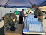 Members of the Oregon Army National Guard delivered and helped distribute thousands of face coverings for agricultural workers at the Polk County fairgrounds in Rickreall May 27, 2020. The Guard collaborated with the Oregon Department of Agriculture and Oregon University Extension.