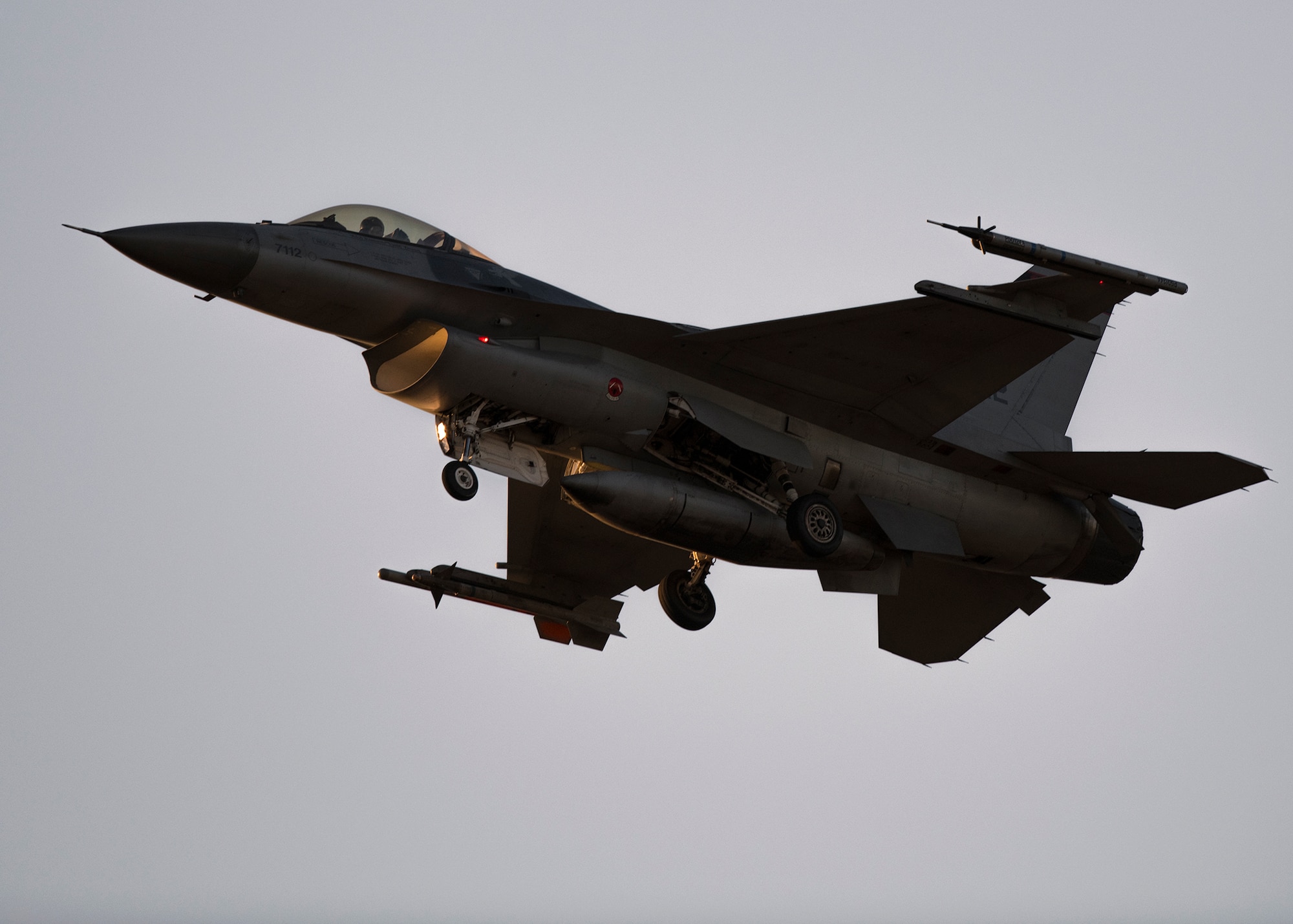 F-16 Fighting Falcons at dusk
