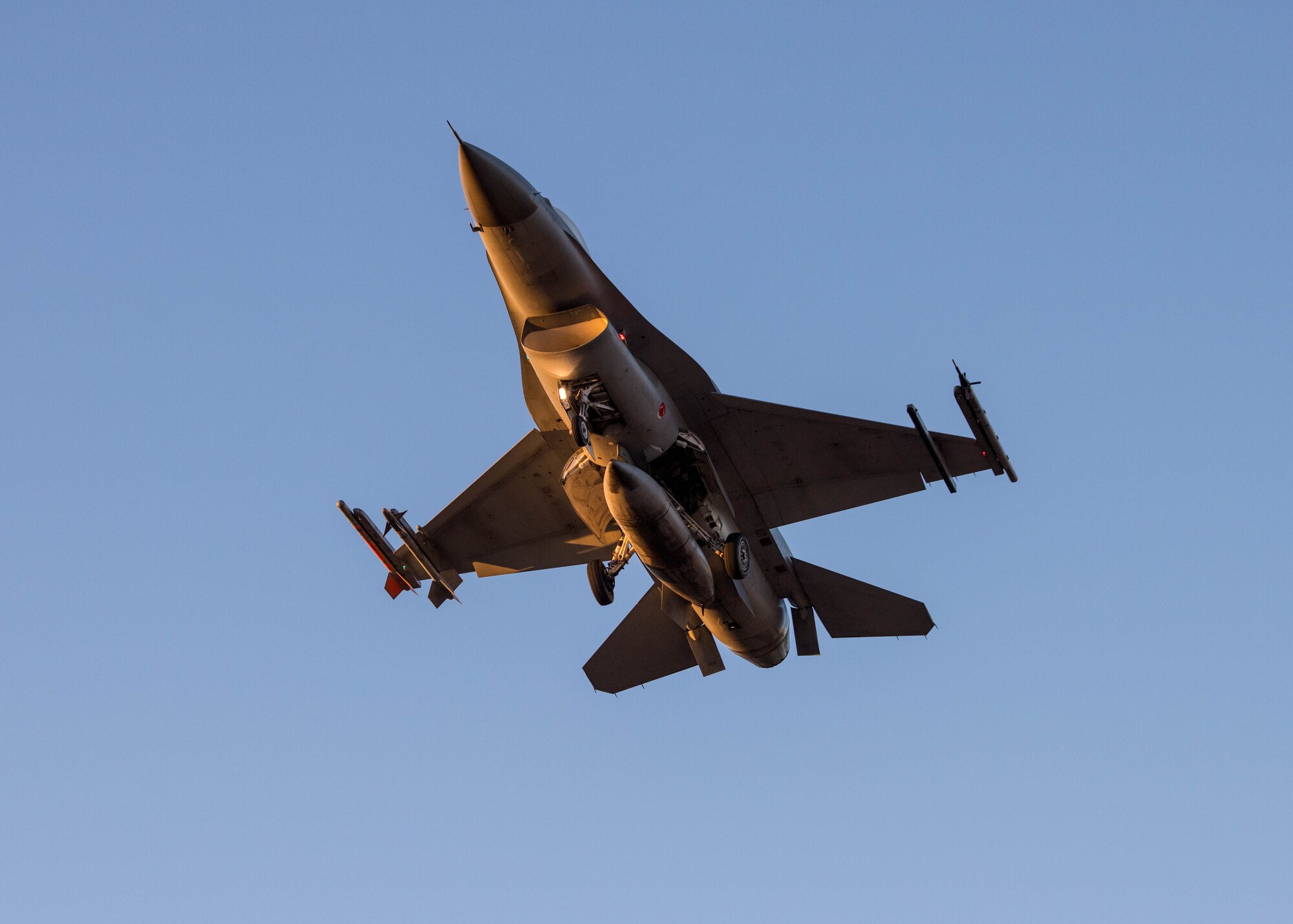 F-16 Fighting Falcons at dusk