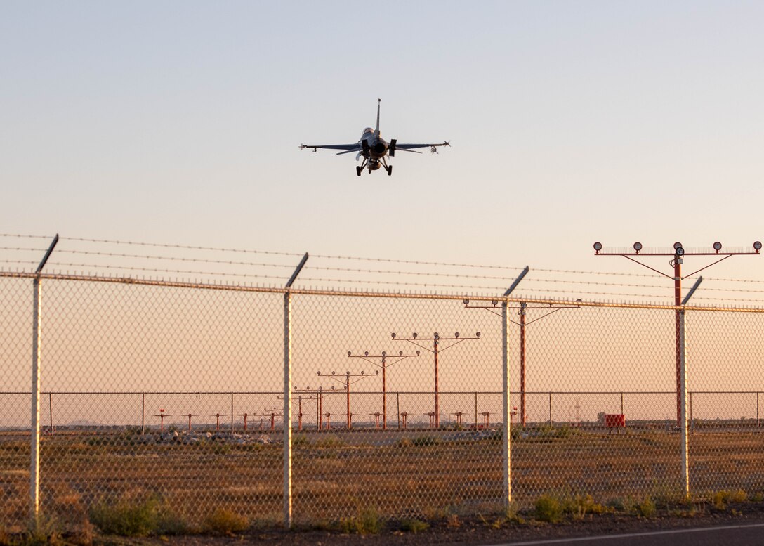 F-16 Fighting Falcons at dusk