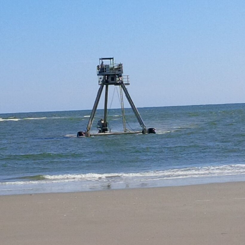 The CRAB, or Coastal Research Amphibious Buggy, conducts surveys in the surf zone during initial construction of the Great Egg Harbor Inlet to Townsends Inlet project. Work included constructing a dune and berm system in  southern Ocean City, Strathmere in Upper Township, and Sea Isle City.