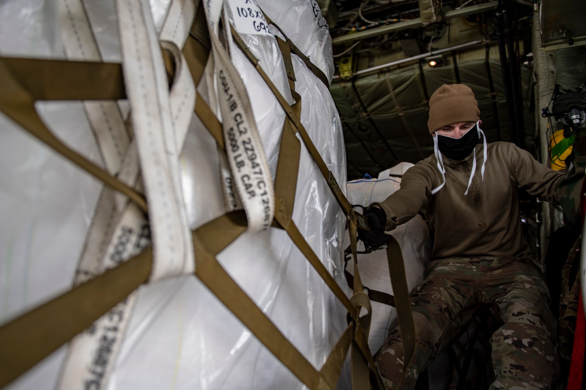 Tech. Sgt. Thomas Himmel, 910th Aircraft Maintenance Squadron crew chief, loads cargo for the Department of Defense’s Denton Program onto a C-130 Hercules assigned to the 910th Airlift Wing at the Pittsburgh International Airport Air Reserve Station, Pennsylvania, April 30, 2020.