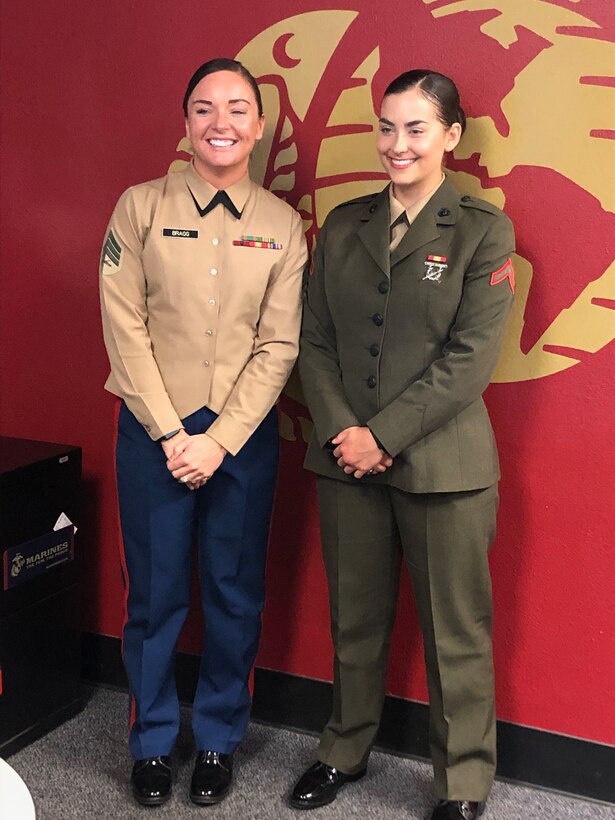 U.S. Marines Sgt. Jeninifer Bragg, a recruiter with Recruiting Sub-Station Poway, Recruiting Station San Diego, left, and then Pfc. Jacqueline Kliewer, a Marine musician, pose for a photo at Recruiting Sub-Station Poway, Jan. 6, 2020. Kliewer had many obstacles on her way to earning the title United States Marine, but now Kliewer has strength and confidence to overcome anything. (U.S. Marine Corps photo by Sgt. Bernadette Plouffe)