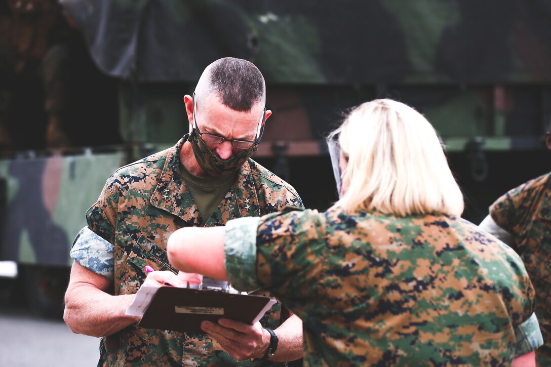 Marine Corps general going through a COVID-19 screening.