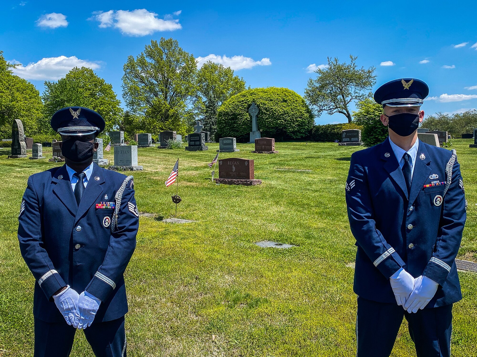 Wright-Patterson Air Force Base Honor Guard members Staff Sgt. Sean Chapman, left, and Senior Airman Rodney Petrie honor the life of Hilton Carter, a Tuskegee Airman, May 13 at St. Joseph Cemetery just south of Columbus along Route 23, not far from Rickenbacker Airport, Columbus. (Contributed photo)