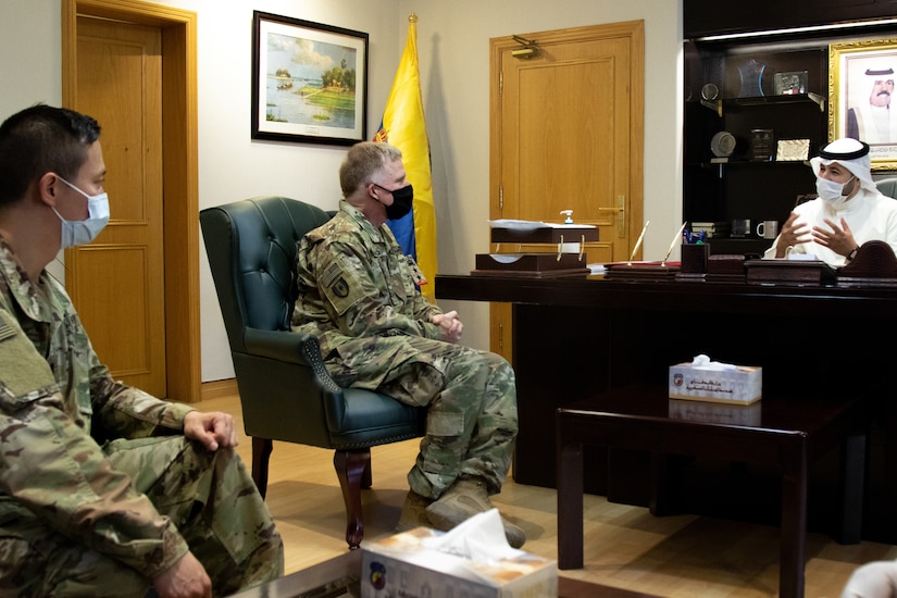 U.S. Army Capt. Yusheng Chen, left, a dentist with Area Support Group - Kuwait, and Col. Ian Black, center, the command surgeon for 1st Theater Sustainment Command, meet with Sheik Abdullah M. Al-Sabah, chief of medical services for the Kuwait Ministry of Defense, before they are presented Kuwaiti medical licenses at the Kuwait Armed Forces Hospital in Sabah Al Salem, Kuwait, May 19, 2020. Black and Chen are the first U.S. military personnel to be licensed to practice medicine at Kuwait Ministry of Defense hospitals, an initial step toward achieving medical interoperability between the two nations. (U.S. Army photo by Sgt. Sean Harding)