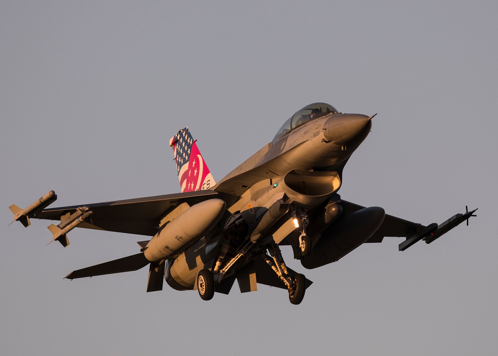 F-16 Fighting Falcons at dusk